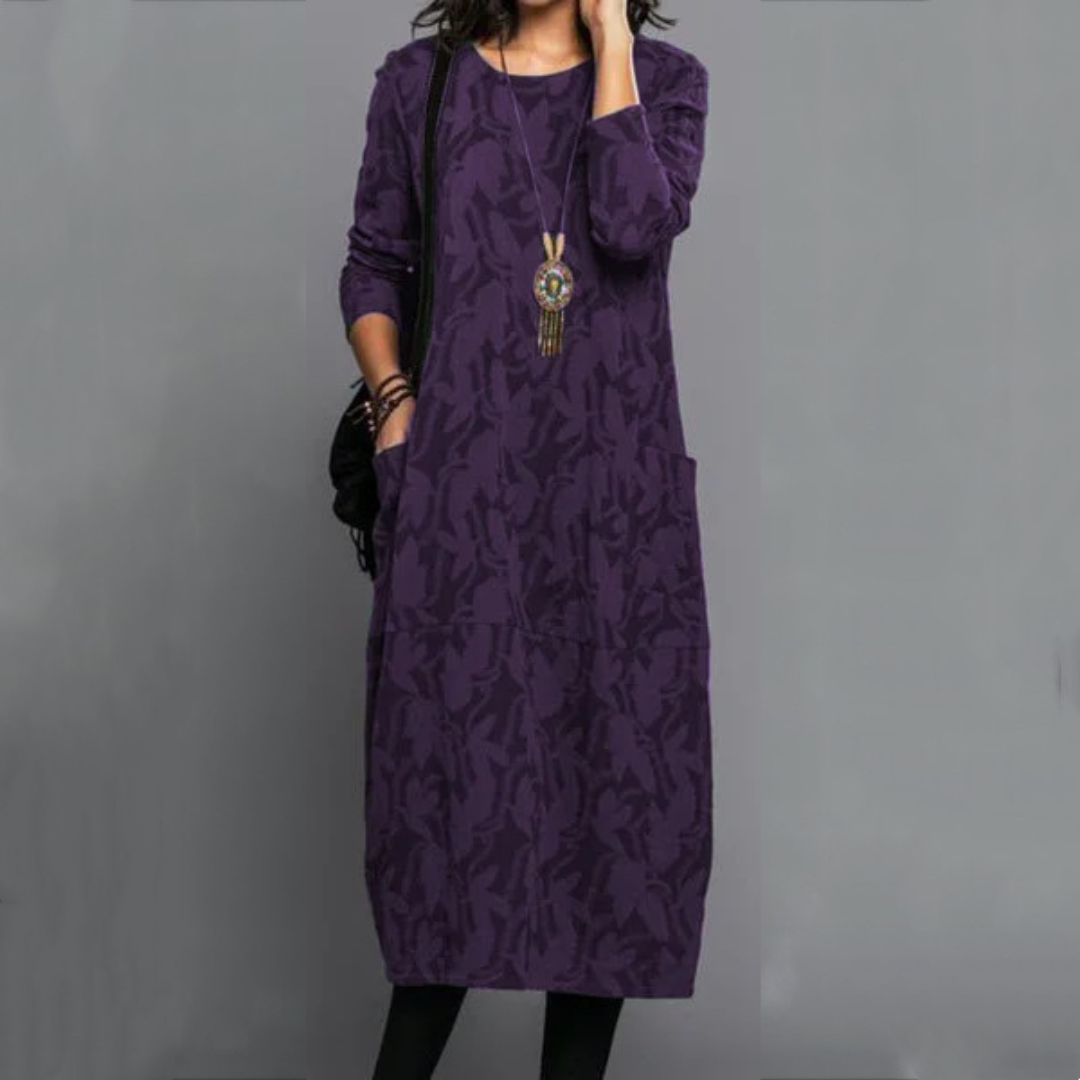 Vestido curto midi feminino com decote redondo, mangas longas, bolso lateral e estampa sutil de folhas