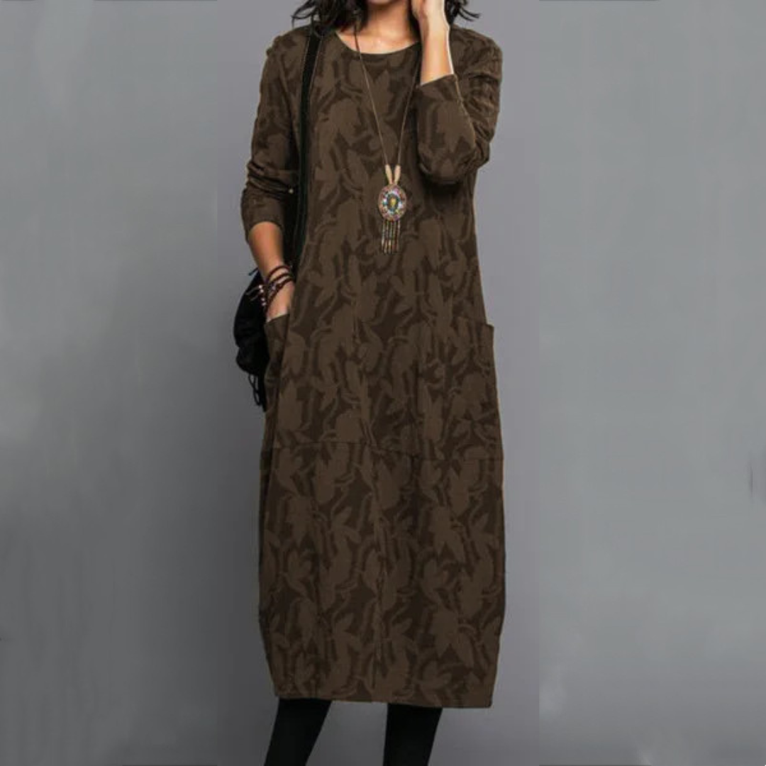 Vestido curto midi feminino com decote redondo, mangas longas, bolso lateral e estampa sutil de folhas
