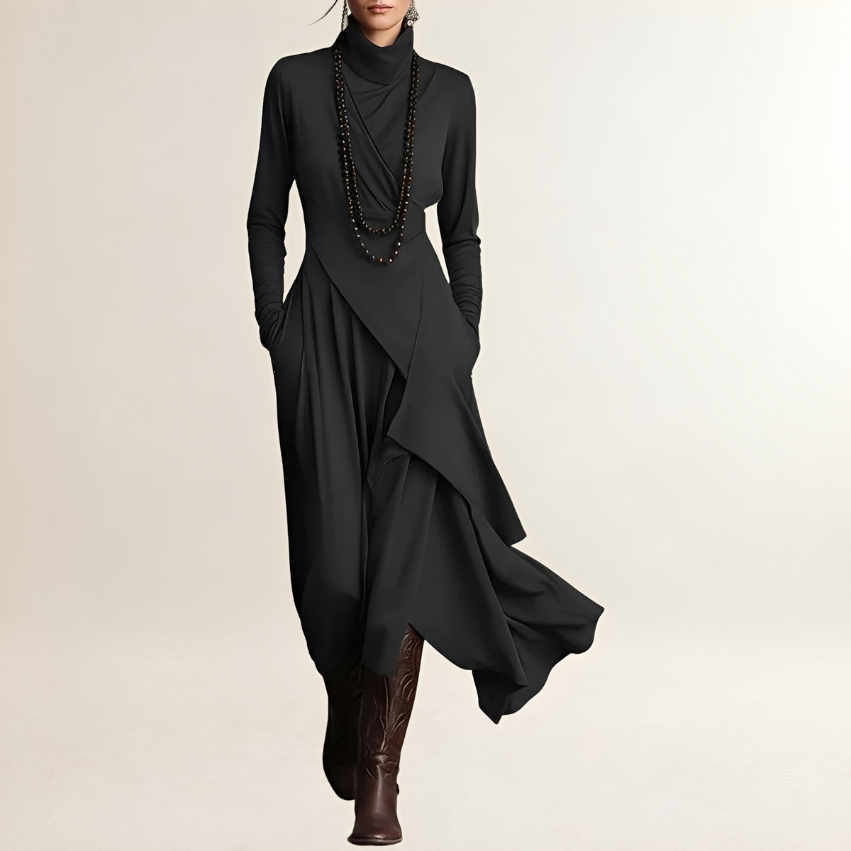 Vestido maxi feminino com gola alta, corpo drapeado cruzado, manga longa, barra assimétrica com camadas e bolsos laterais