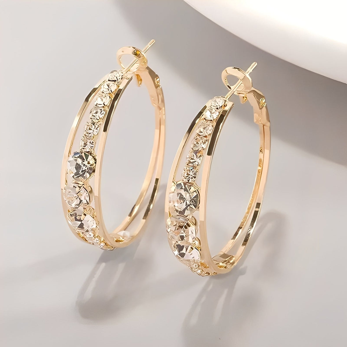 Raya – Brincos elegantes em ouro