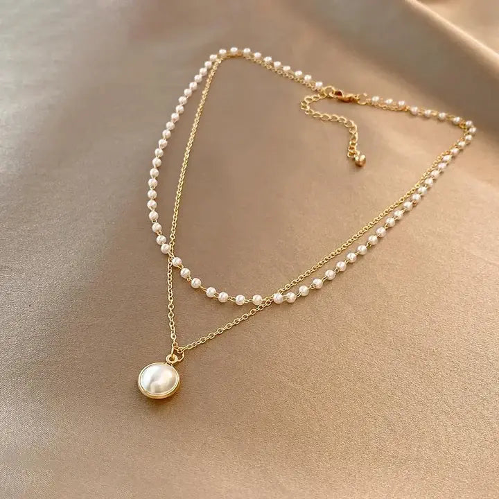 Auriane – colar elegante de pérolas e corrente de ouro