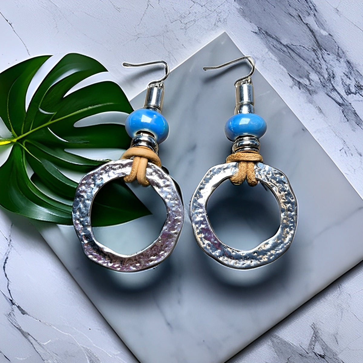 Mira – Brincos em círculo prateados de estilo boho-vintage