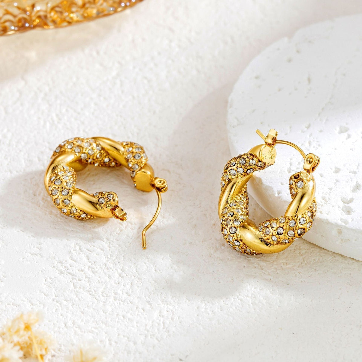 Alix – Boucles d'oreilles U-Twist em ouro