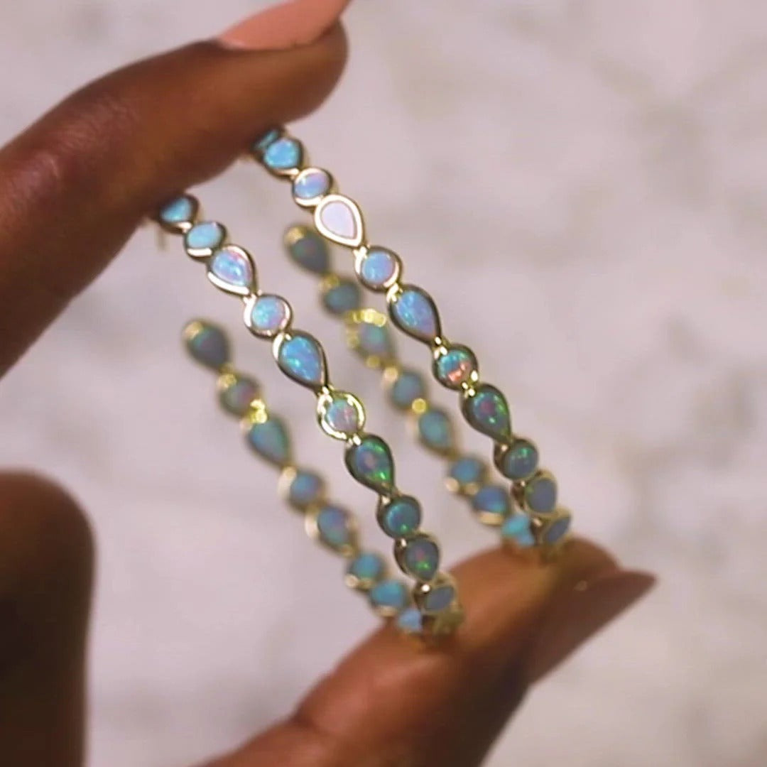 Raya – Brincos vintage dourados com opala azul