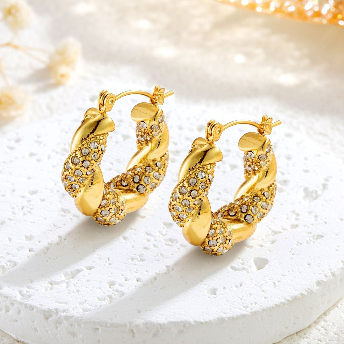 Alix – Boucles d'oreilles U-Twist em ouro