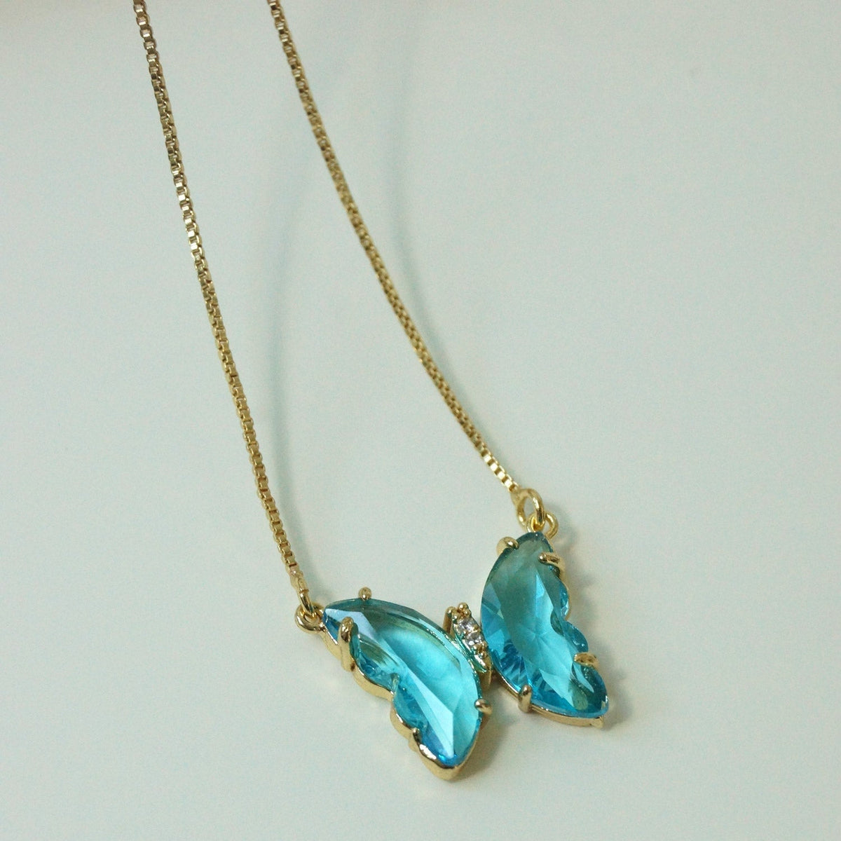 Aurora - Colar borboleta aqua
