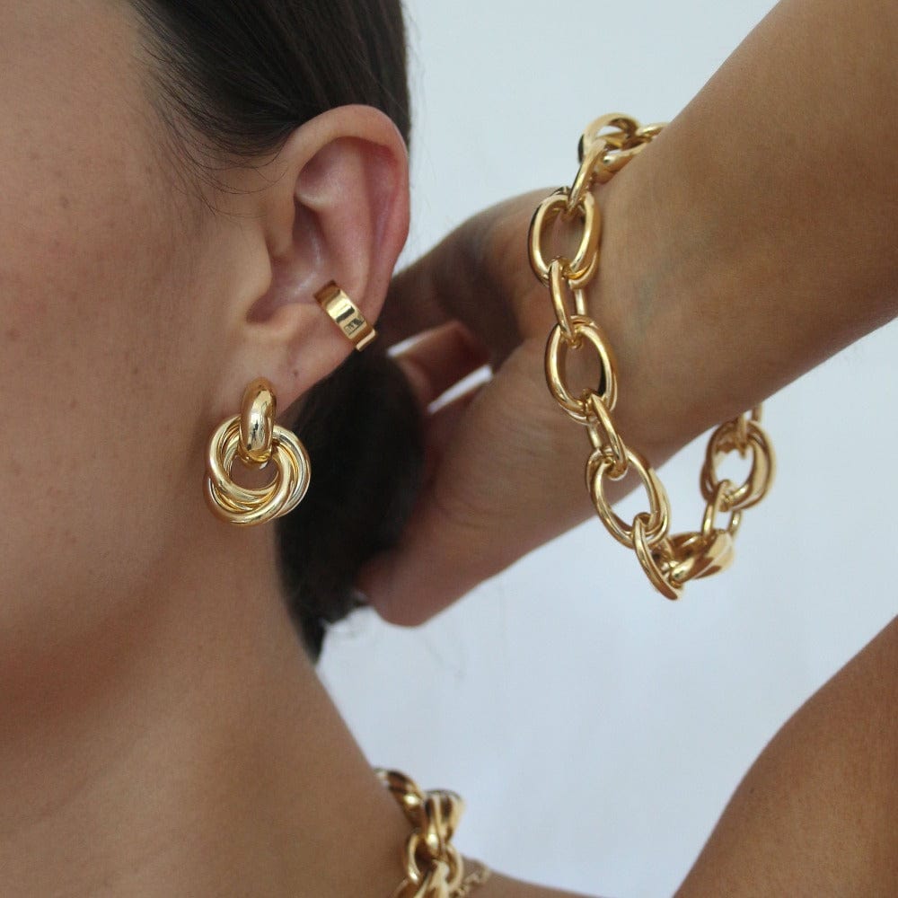 Rania – Brincos dourados com design entrelaçado
